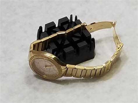 michael kors watch pins fall out|accidentally pulled my watch link pin.